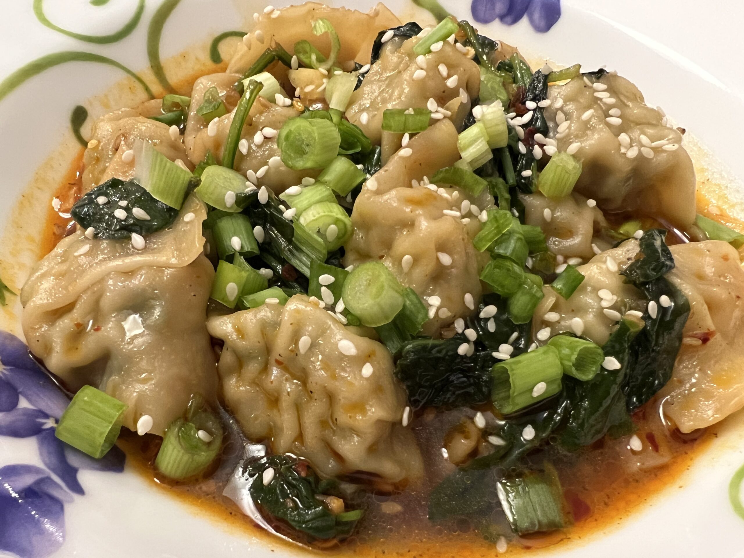 Chicken Wontons in Spicy Chili Sauce
